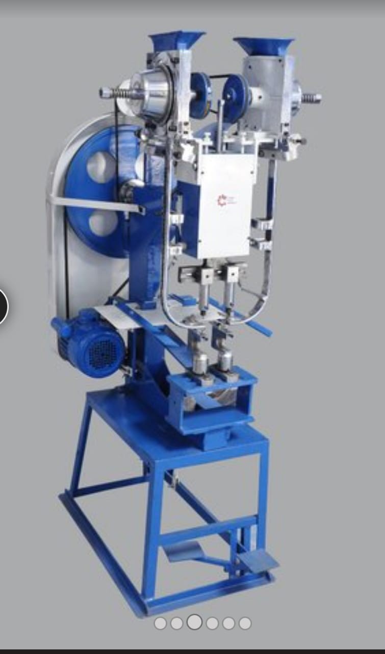 automatic eyelet punching machine in kerala